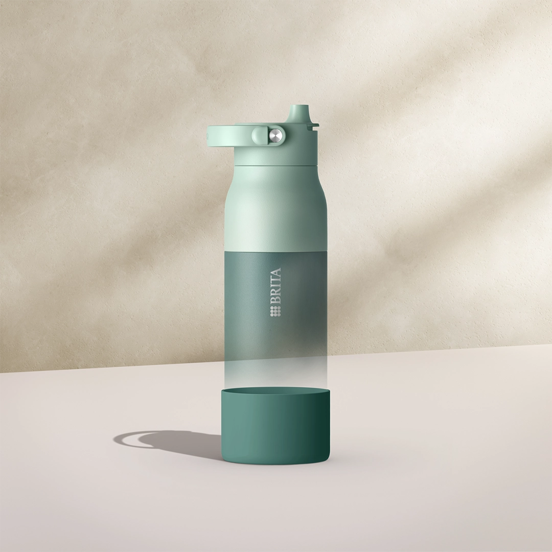 Green silicone boot for BRITA LARQ water bottle.